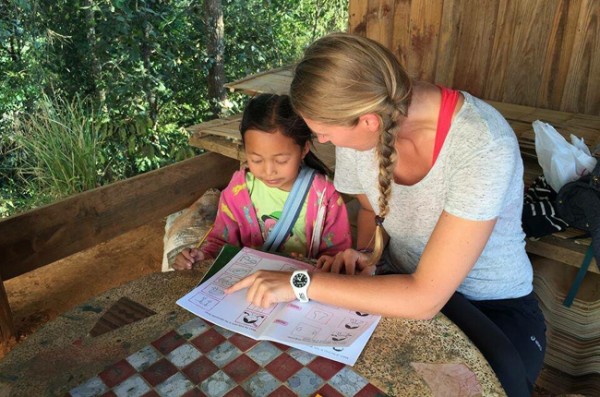 Volunteer at Journey to Freedom teaching English to the hill tribe children